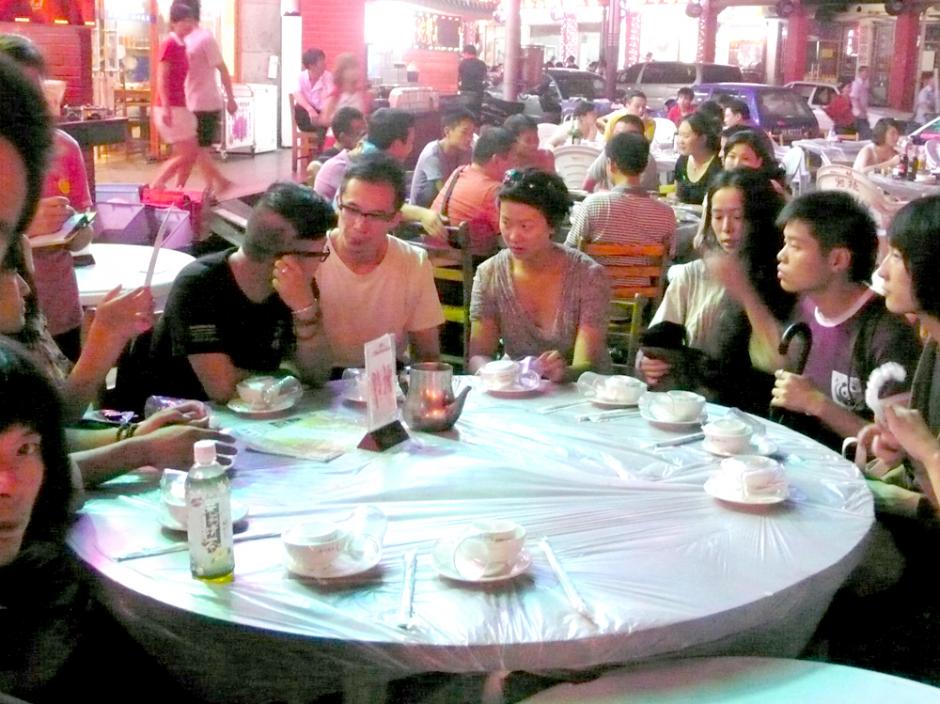 After party of a concert at an outdoor restaurant, Changsha, 2010. Photo by Yan Jun